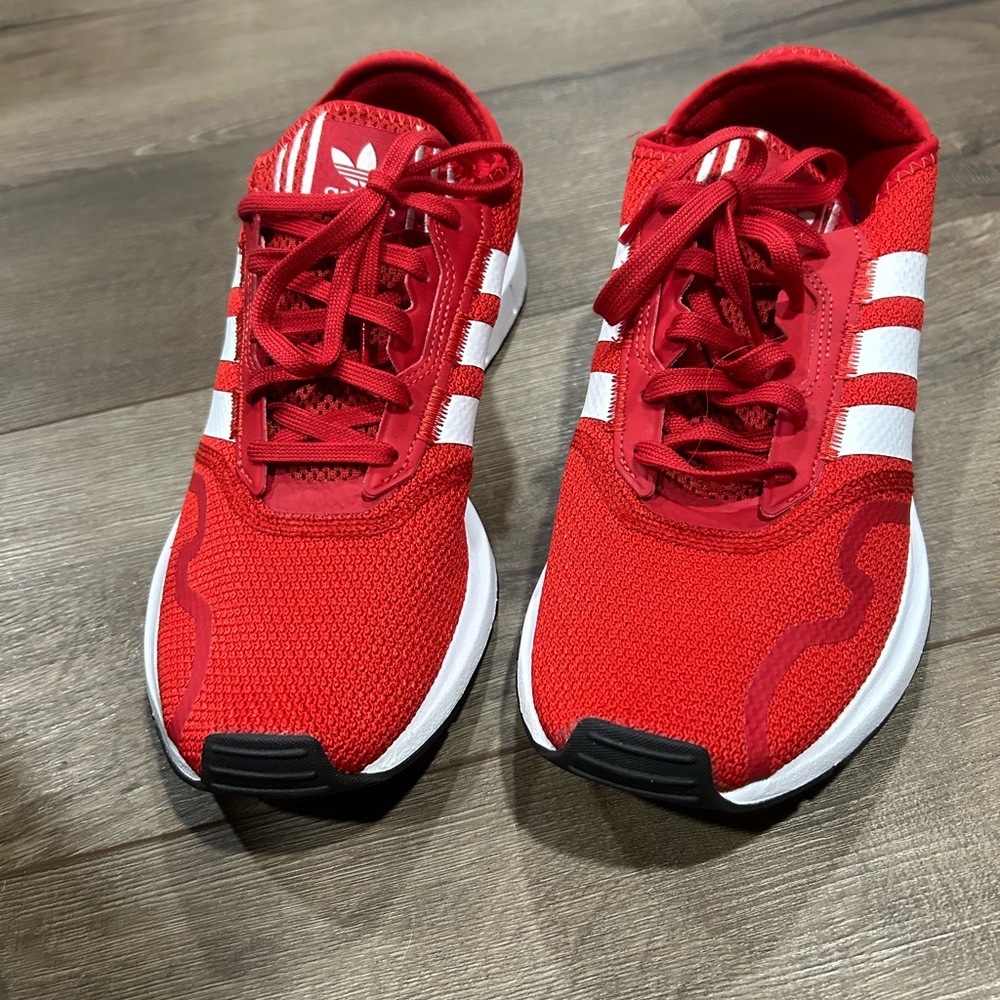Like new. Men’s red adidas